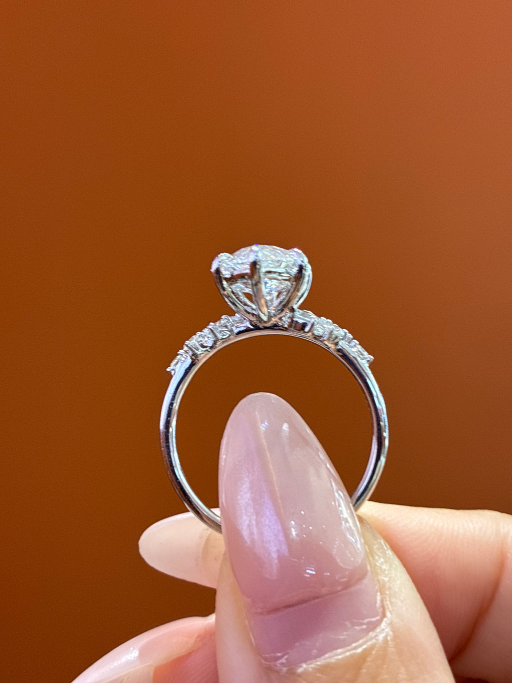 Deposit  for nicki 18k Marquise center stone, 5 carats, with approximately 0.33 carats of side stones, featuring a petal-style setting D/vvs2