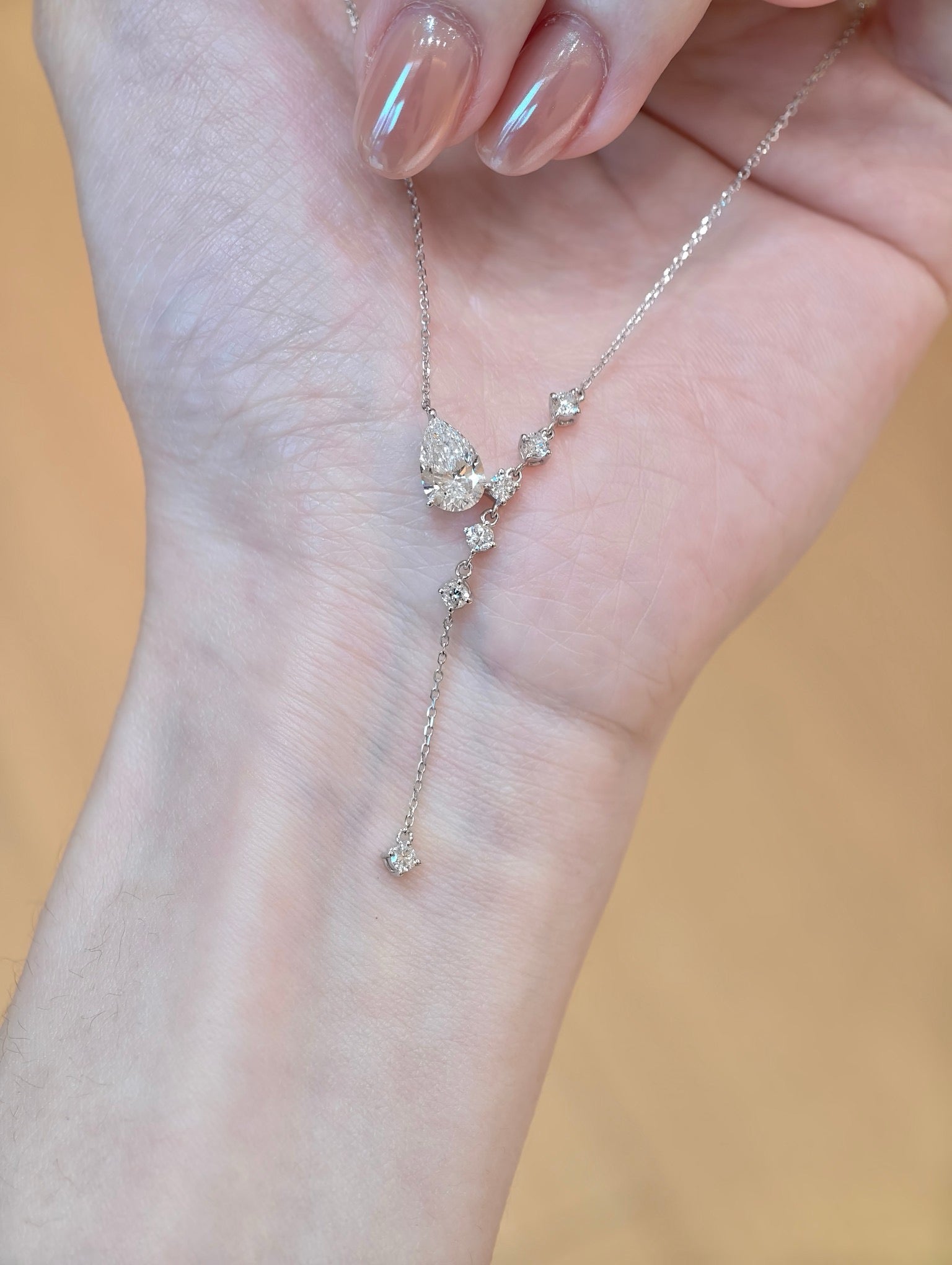 Pear Shape Lab Grown Diamond Necklace | Graduated Teardrop Pendant with Round Brilliant Cut Accents | Platinum Diamond Jewelry