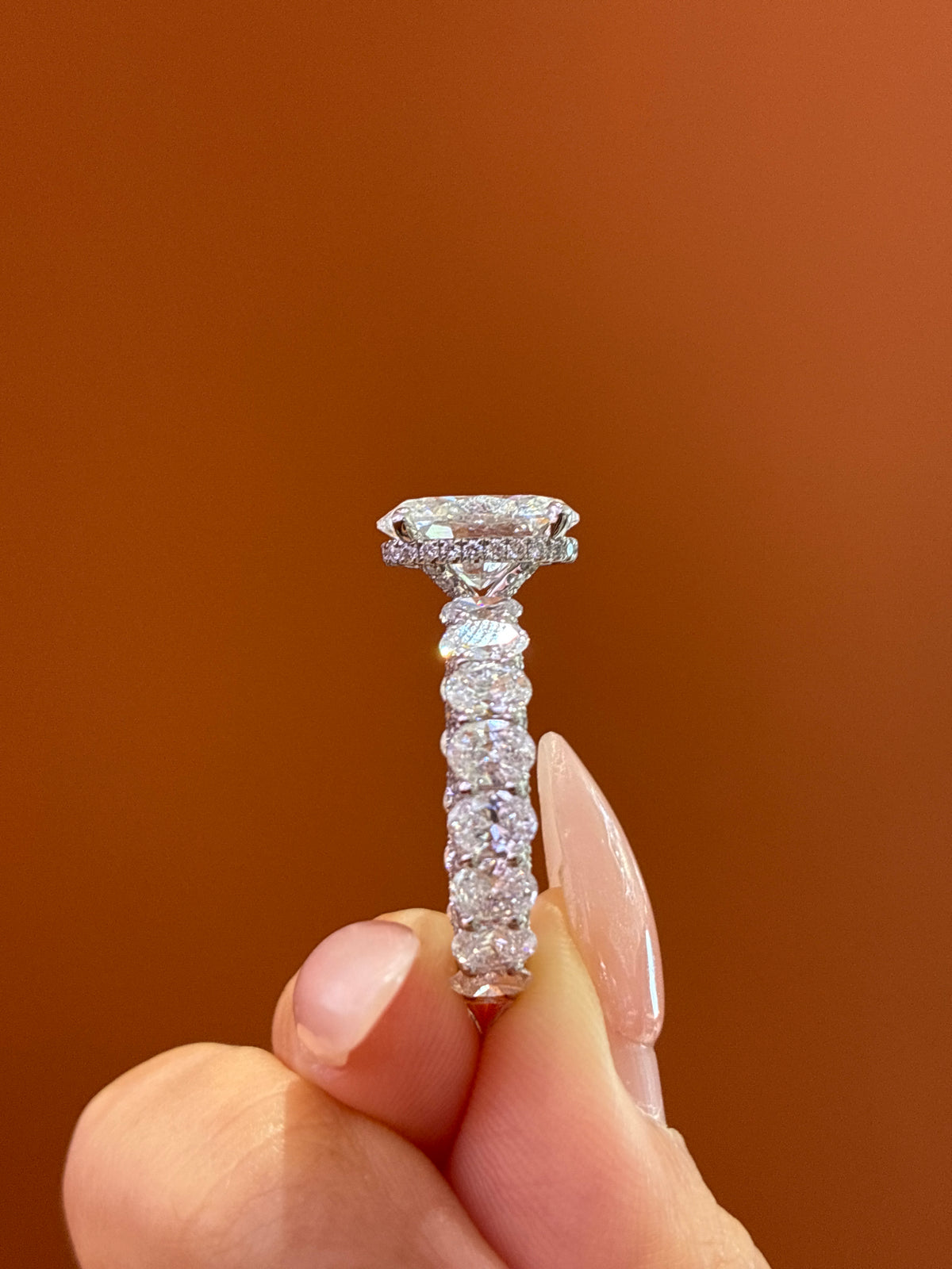 For Shaylyn — 18K White Gold, Oval-Cut White Diamond, center stone approximately 3.2 carats, side stones approximately 4.5 carats, D/VVS2.