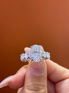 For Shaylyn — 18K White Gold, Oval-Cut White Diamond, center stone approximately 3.2 carats, side stones approximately 4.5 carats, D/VVS2.