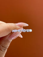 Deposit for use white marquise eternity band, featuring a 1.25-carat center stone and 0.6 carat of side stones, D/VVS2.