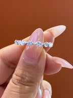 Deposit for use white marquise eternity band, featuring a 1.25-carat center stone and 0.6 carat of side stones, D/VVS2.